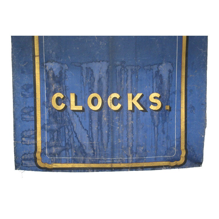 Gold painted lettering on deep blue painted roll up shade cloth. Note the shade was mostly rolled up with the lettering showing as seen from the lower portions slight fading and water marks. Signed E.M. Gammon, Portland, ME. It can be displayed at