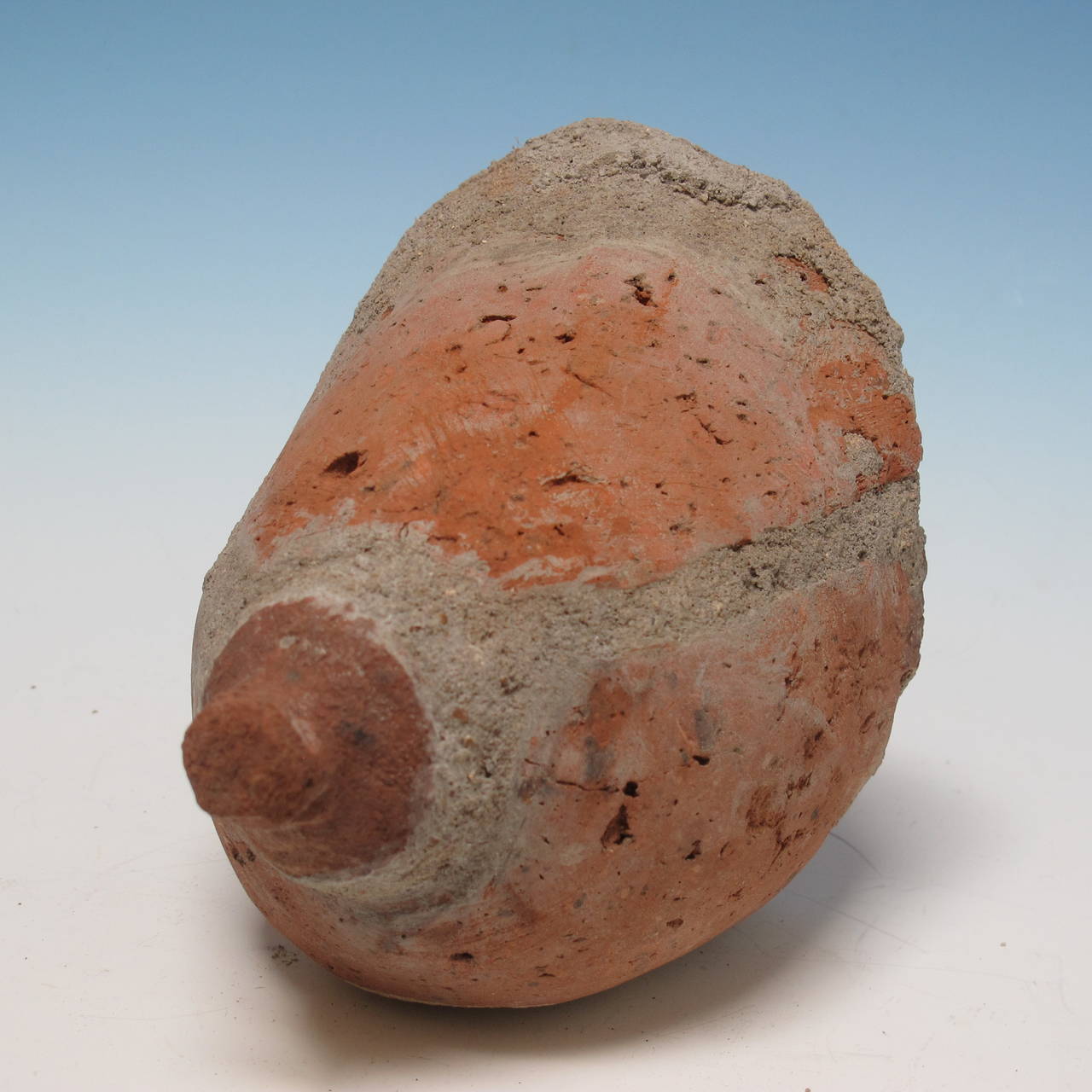Hoard Jones creates compelling objects from common materials. In this case the breast is carved from hard brick and mortar. The piece comes with a metal Stand which floats it or can be wall-mounted.