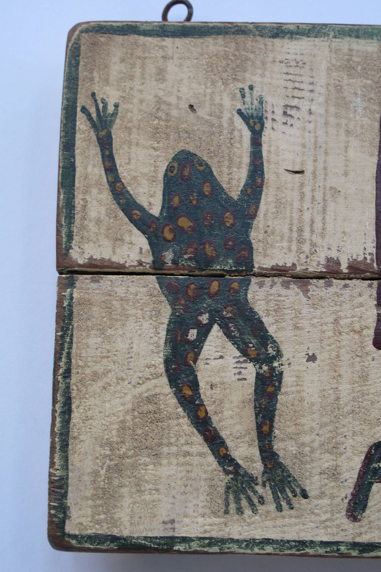 Wonderful old wooden sign with two painted leaping frogs and free-form lettering with frog pattern. I'm sure this is a one of a kind sign to let passerbys know that frogs were available. For what I can't be sure. I suppose as bait or for frog legs.