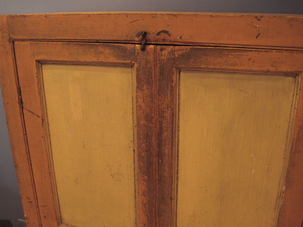 19th Century Cupboard With Salmon And Yellow Paint For Sale