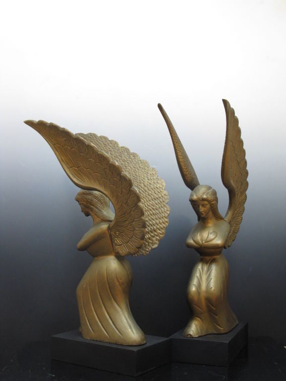 Gold painted wood with cast metal wings on angels. Made for use on the Ark of the Covenant chest carried ceremonially.  These are particularly fine examples of lodge art. Indiana, ex. Raymond Saroff collection