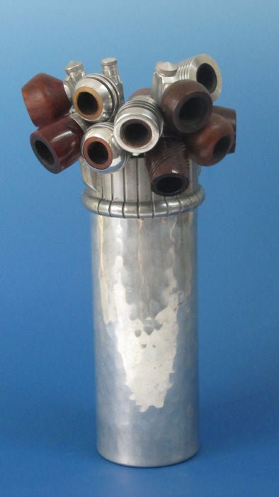 Sculptural smoking pipes of aluminum, burl and other materials.  The pipes are sold as a group.  The collection was dislayed as a bouquet of pipes in an aluminum cocktail shaker as part of the Brams Collection.