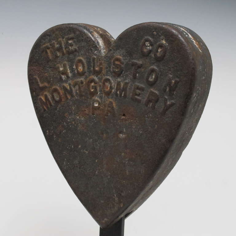 The cast iron heart wight would have been attached to the tail of a large farm windmill as a counterweight to balance the large propeller. This form is quite rare as most of the weights were made in the form of farm animals. This has raised