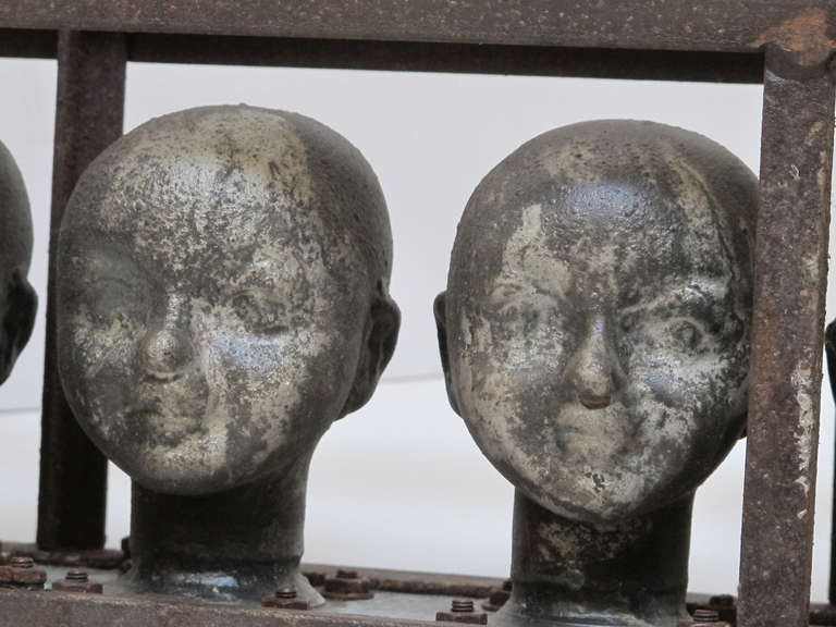 Doll Head Molds in a Metal Frame In Good Condition In New York, NY