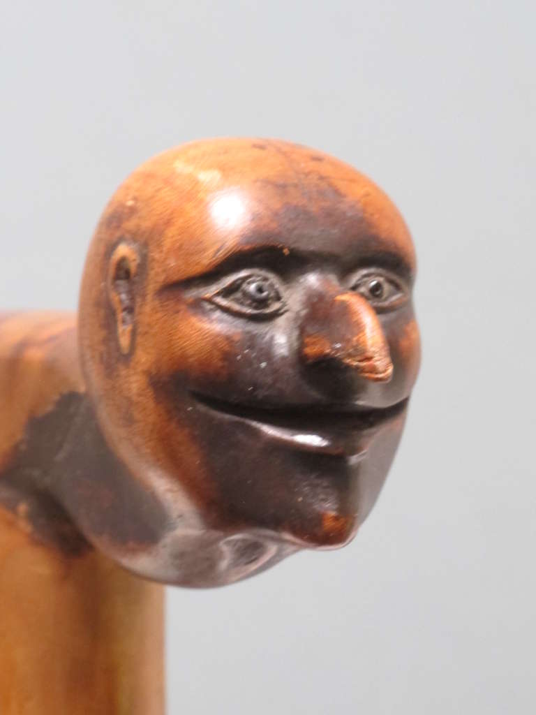 Carved Cane with Grinning Head
