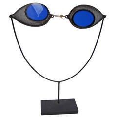 Antique Blue Glass Goggles on Base