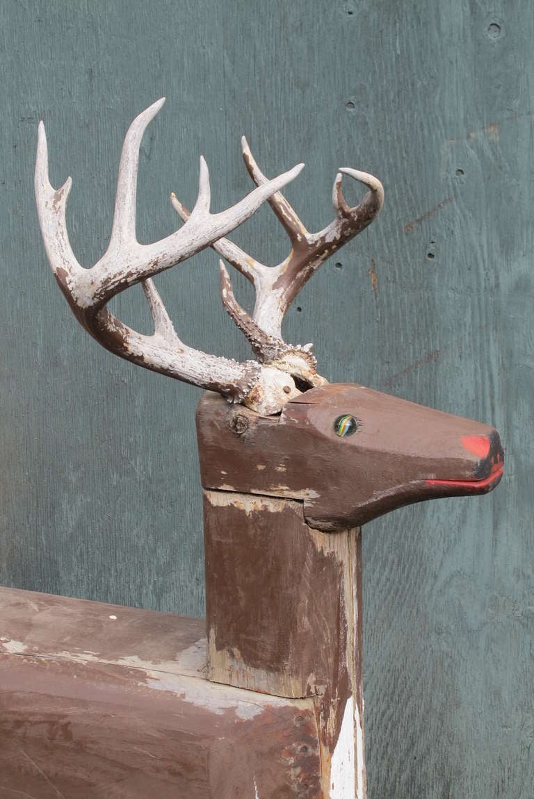 wooden deer sculpture