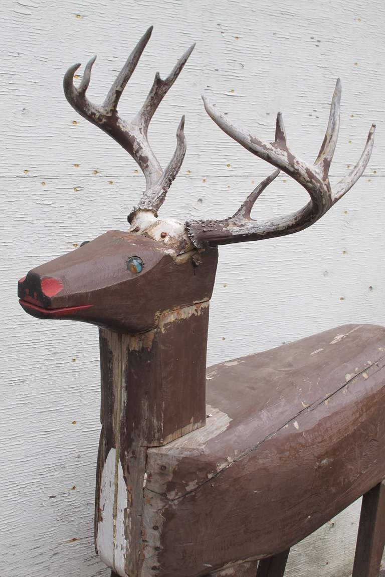 wood deer sculpture