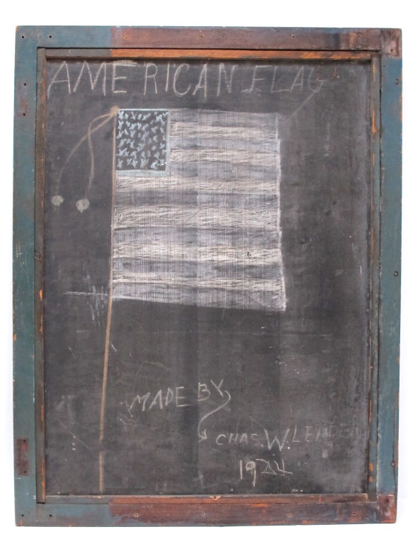 I bought this small size slate blackboard with a chalk ledge below not knowing there was an old child's drawing on the back side. The American flag is signed Chas. W. Leader, dated 1924 or 1944.  Nice old paint on the frame and tray. Have chalk, no
