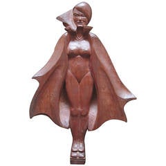 Caped and Nude Carved Woman