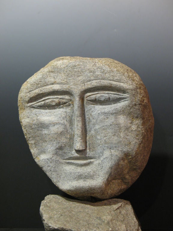 Granite head on stone base by self taught artist Ted Ludwiczak.<br />
Suitable for garden or indoor installation. From Ted Ludwiczak's <br />
stone heads environment. Related stone pieces in collections of American Visionary Art Museum and