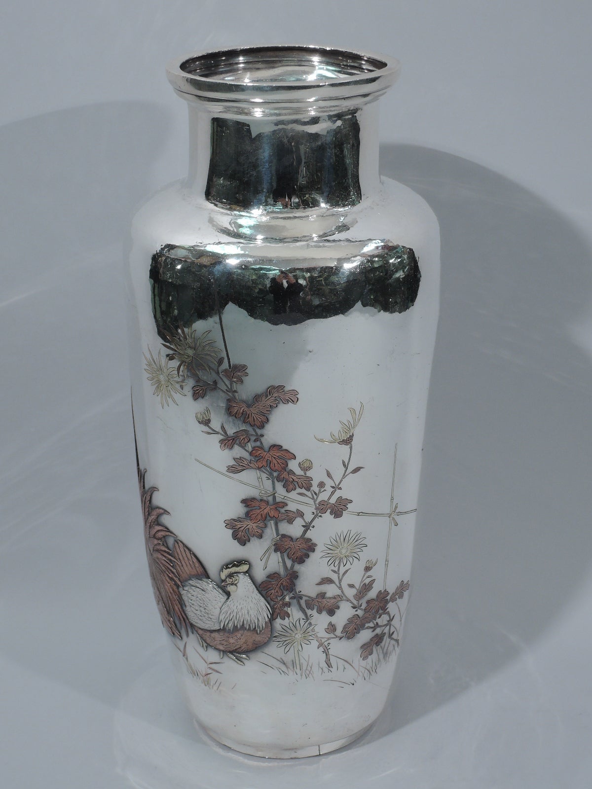 Aesthetic Movement Large Japanese Silver and Mixed-Metal Vase with Flurried Fowl
