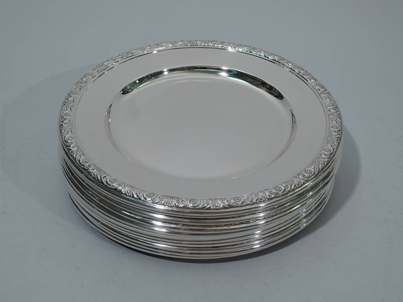 American Set of Twelve International Prelude Sterling Silver Bread and Butter Plates