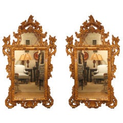A pair of c. 1930's Italianate mirrors in the Chippendale style.