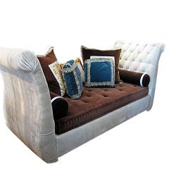 custom  day bed with array of corresponding pillows.