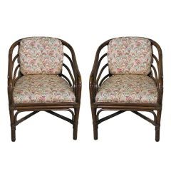 A pair of c. 1970's teak salon chairs