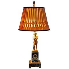 A c. 1920's French lamp with ormolu Napoleon