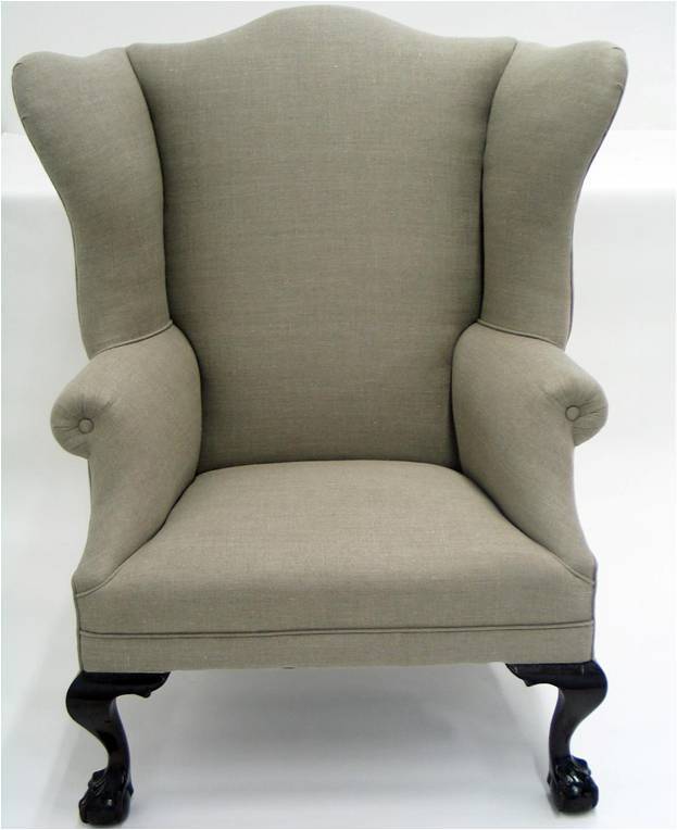 A curvaceous  English wing chair