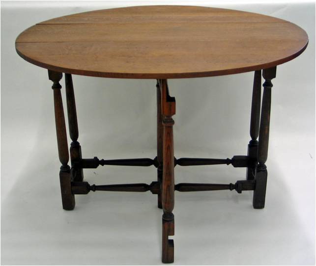 A c. 1890 - c. 1900 English drop leaf table
