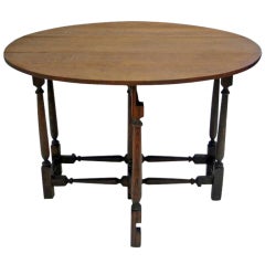A c. 1890 - c. 1900 English drop leaf table