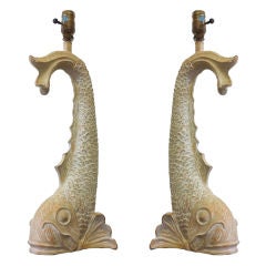 A pair of mid century dolphin table lamps