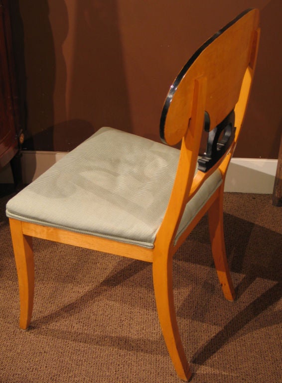 A set of 12 c. 1940's dining chairs