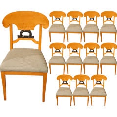 A set of 12 c. 1940's dining chairs