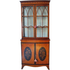 An Edwardian cabinet in two pieces
