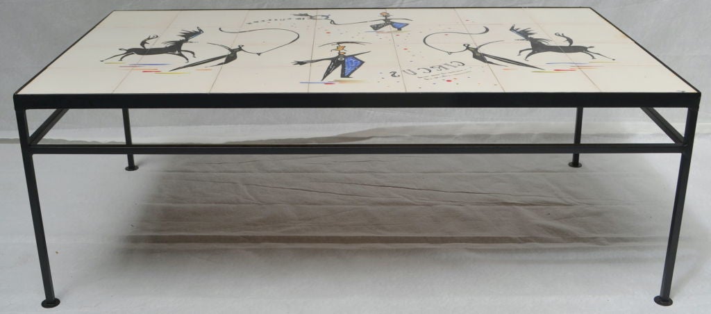 Light-hearted lyrical circus scene by that brilliant ceramicist Tye of California. This striking coffee table was purchased as a wedding gift in 1952.