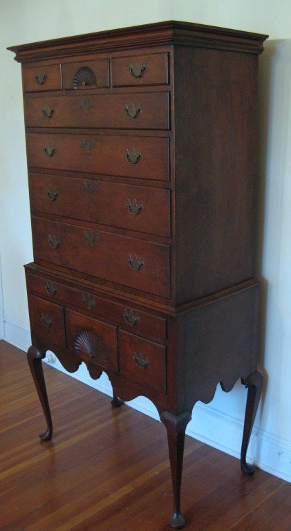 Handcrafted line copy reproduction of a Queen Anne Flat Top Highboy (the original from which this was copied was created between 1750 - 1780) carefully carved in Cherry at the workshop of Eldred Wheeler in Pembroke, Massachusetts in the 1980s. The