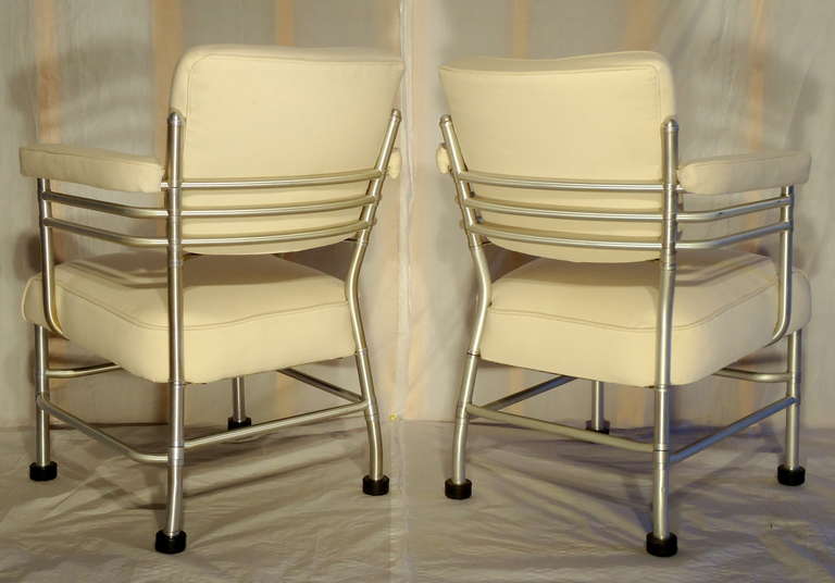 Two very similar but not matched club chairs by Warren McArthur in excellent vintage condition. 
One came from a railroad car and the other from the Park Avenue apartment of the president of a Railroad Supply Company.
Freshly upholstered and in