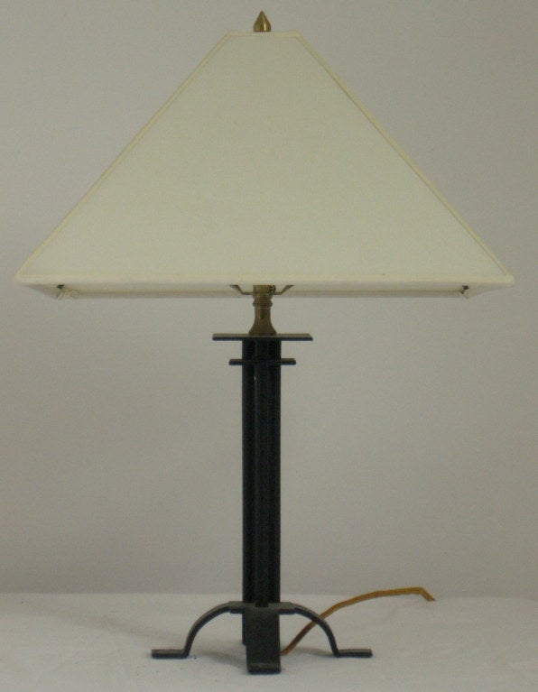 Classic wrought iron table lamp designed by Warren McArthur's older brother Albert Chase McArthur, architect of the Arizona Biltmore in Phoenix, Arizona. 

The McArthur’s commissioned the local veteran's hospital for disabled World War I soldiers to