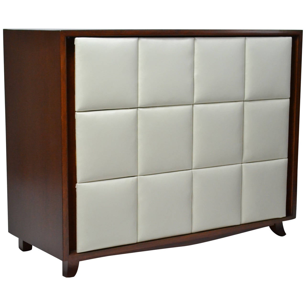 Gilbert Rohde for Herman Miller from the early 1940s  three-drawer mahogany dresser with vinyl paneled drawer fronts. 
The bureau is in excellent condition.