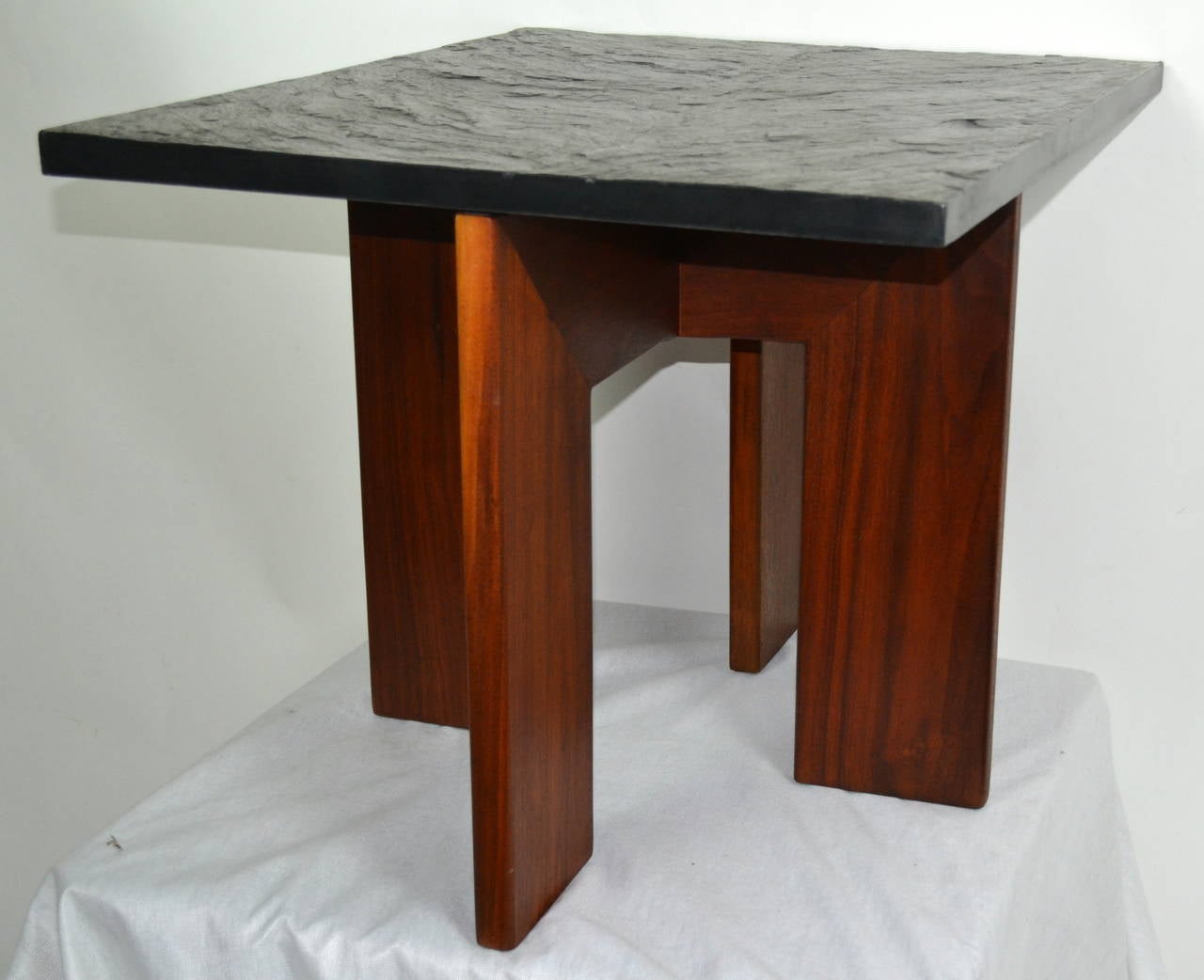 Walnut based end table by Adrian Pearsall for Craft Associates with its original slate top.
The base and slate top are in excellent condition.