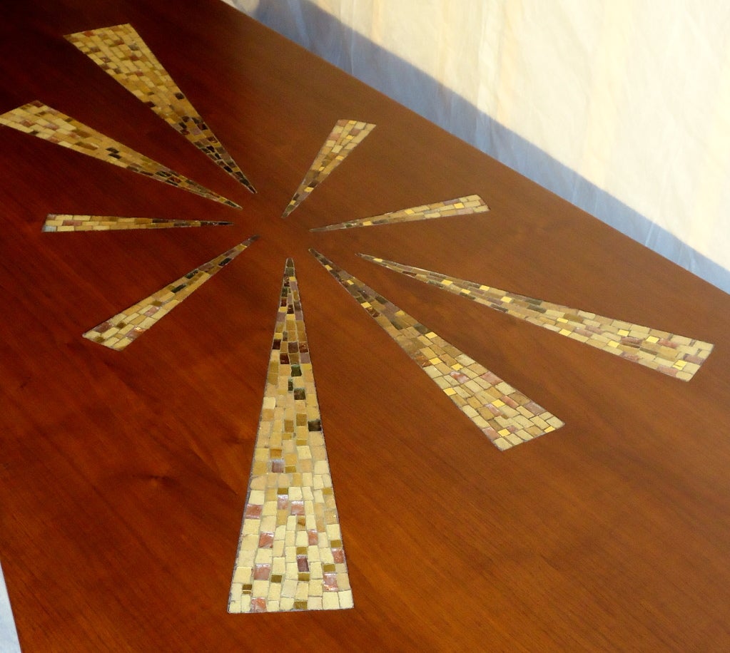 Large walnut coffee table with interesting star burst mosaic of Italian glass tile purchased in New York in the late 1950s-early 1960s. Kagan Pearsall school of American design.
The table has been professionally restored and is in excellent