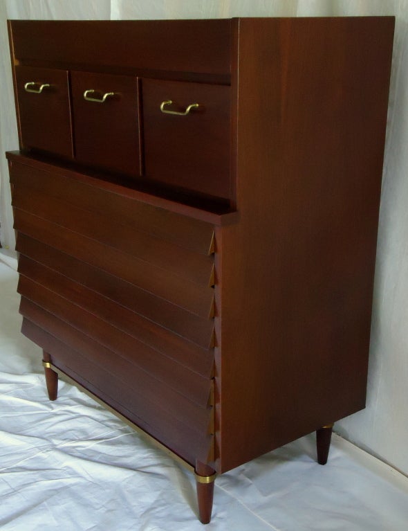 A classic tall chest by Merton Gershun for his Dania collection manufactured by American of Martinsville.
The dresser has been professionally restored and is in excellent condition.

