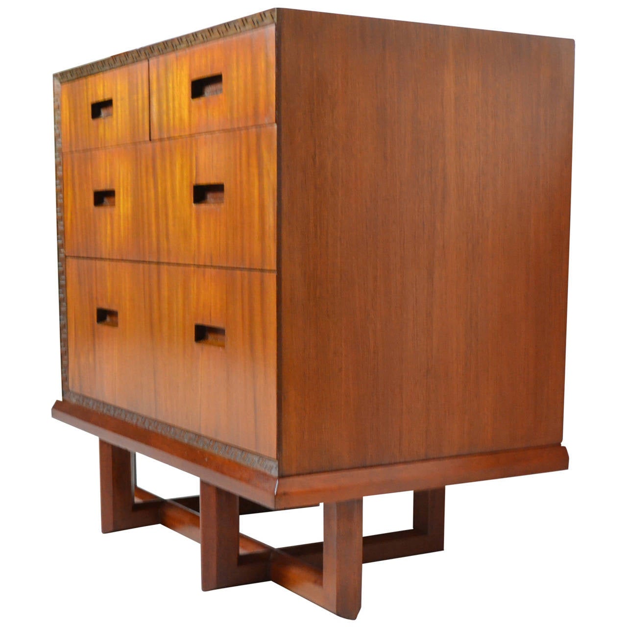 Frank Lloyd Wright mahogany four-drawer dresser on a cradle base from the 