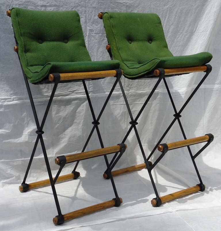 A Classic pair of Cleo Baldon high back bar stools for Terra Furniture, circa 1965. 

The frames have professionally restored and are in excellent condition, the upholstery is vintage and should be replaced.