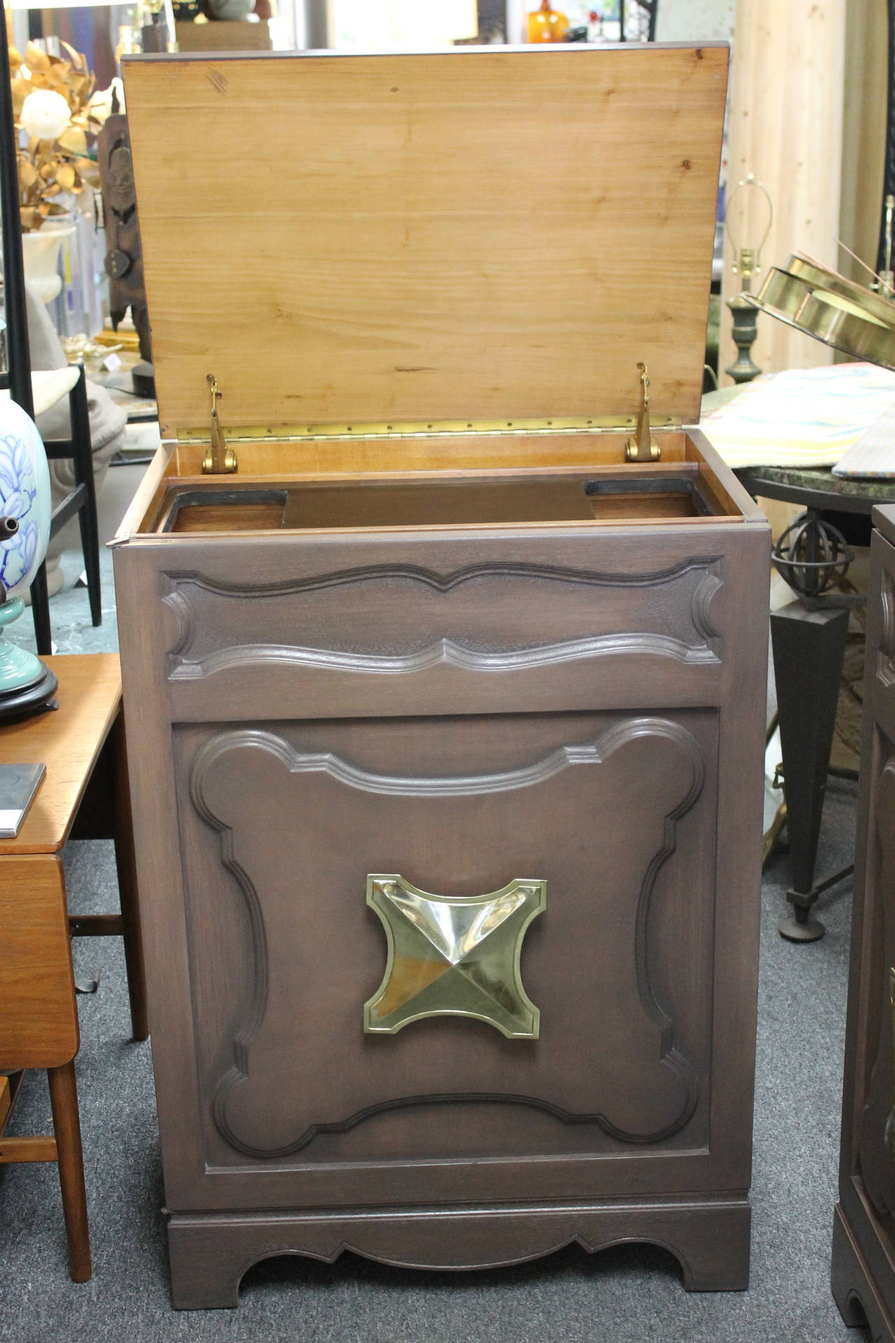 Grosfeld house cabinet or bar with original brass handle. Bar has been refinished on the outside. We left the inside all original. There are two inserts where we believe glass inserts were used. They are not available.