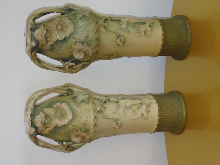 Pair of Austrian Amphora poppy vases. Signed with #11820 47.  Each vase measures 18.5