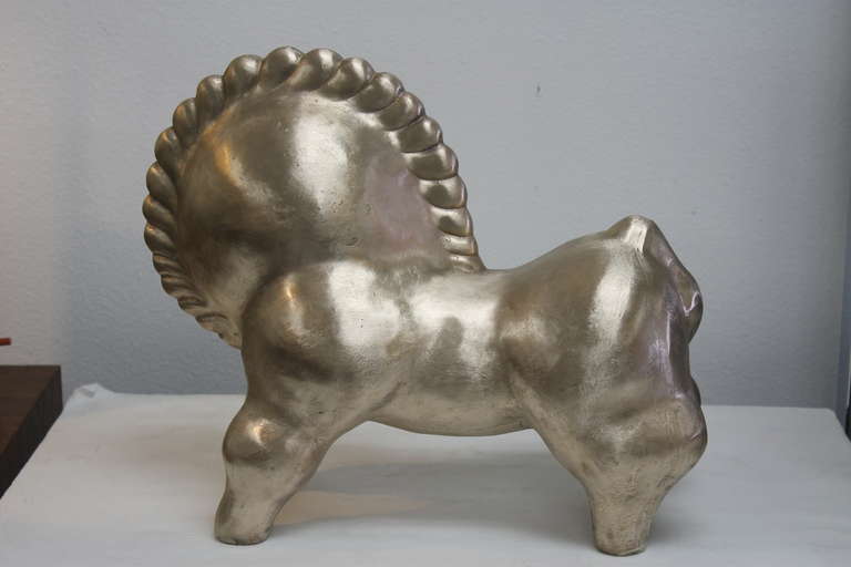 Cast bronze abstract horse sculpture. From a California foundry and modeled after Russell Wright’s 1940’s design is this cast bronze sculpture with brushed finish. This piece measures 16“ long, 14“ high and 7“ wide. USA, 2014. $3600.