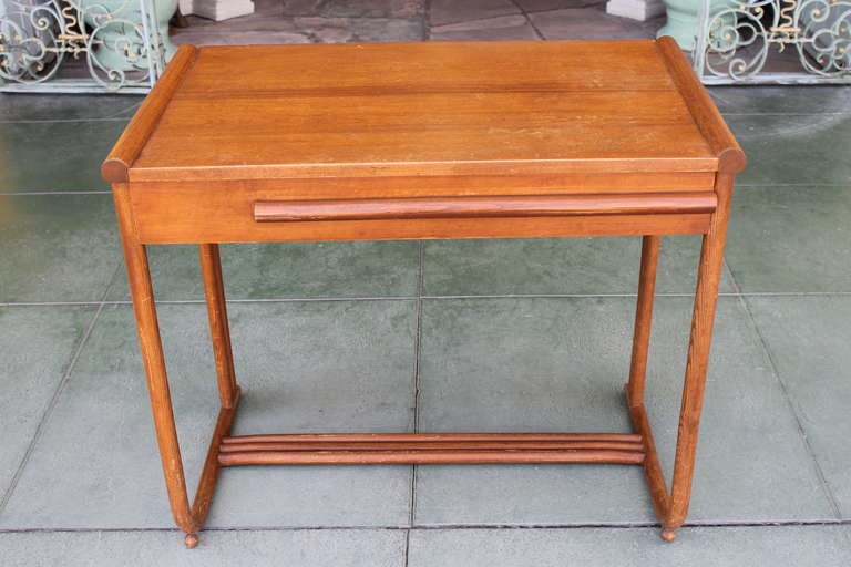 Maple desk by Gilbert Rohde for Heywood Wakefield. American, 1930’s. 34 1/2” wide, 20” deep and 30” high. Good condition with older refinish.
