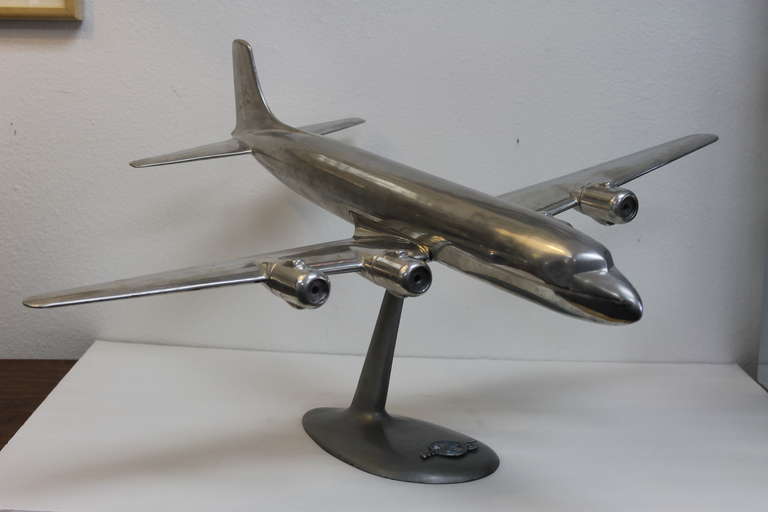 Aluminum Douglas DC-8 model airplane.  We have 3 other different airplanes available