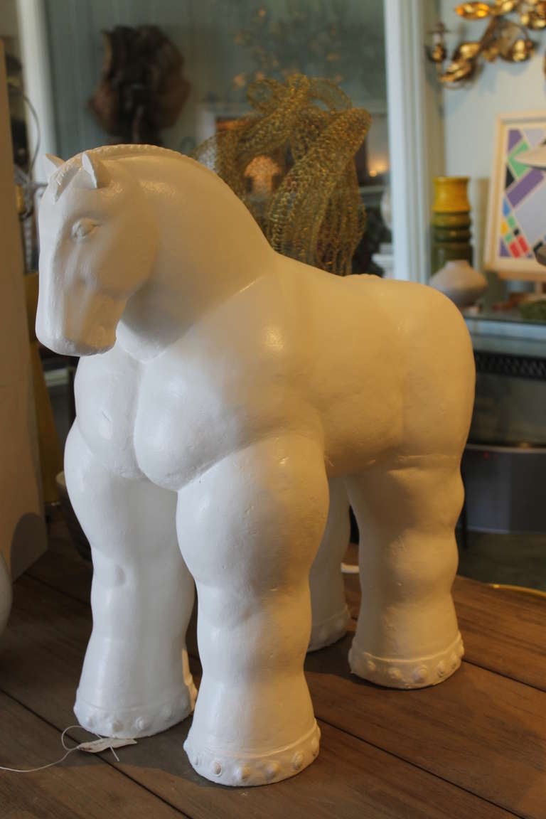 Painted cast stone (composite) Botero style horse sculpture. American, contemporary. 28 1/2” high, 27” long and 14” wide.