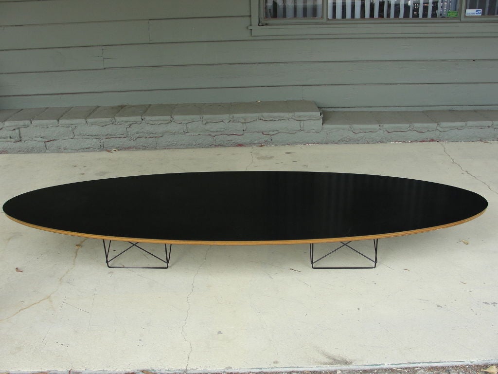Herman Miller Surfboard Table designed by Charles Eames.  The ETR Elliptical Table Rod Base, better known as the Surfboard table, was designed in 1951. All original.