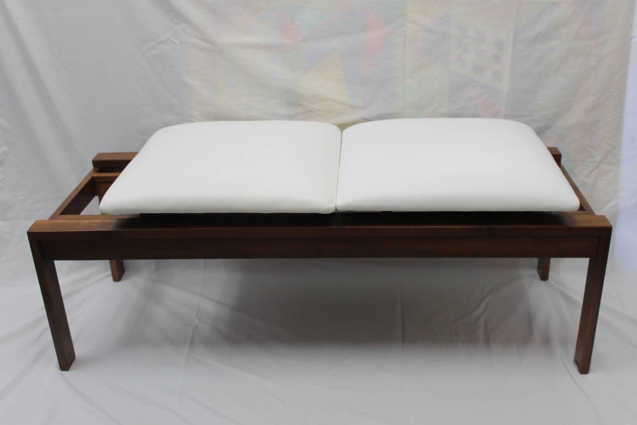 Beautiful Midcentury bench by Martin Borenstein. Only one of the seats can slide as shown in pictures. Measures: Wood base 44” wide x 17” deep x 13.5” high. When cushion is fully extended its 45” wide. Seat height is 16.5" Cushions are 18"
