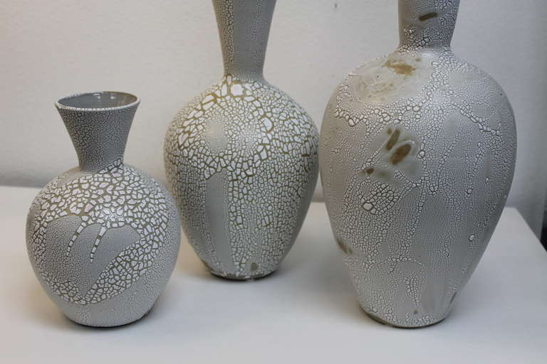 Three ceramic vessels by artist Daric Harvie. These are all one of a kind and executed in Palm Springs, California. They measure 8.5