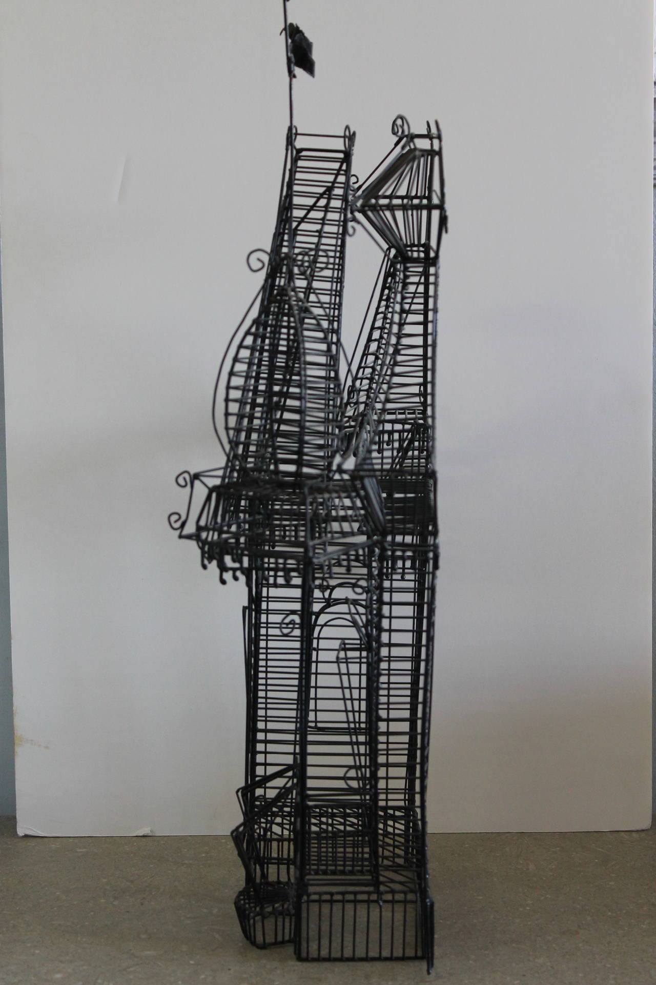 Vintage wire sculpture of Victorian house by Laguna beach artist Guy Pullen. This was part of his Victorian house series from the early seventies. This piece comes with it's original gallery brochure, plus a newspaper article from that same year