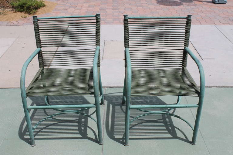 Pair of chairs by Robert Lewis.  A well known design source in Santa Barbara from 1914 - 1952. His designs predate Walter Lamb's and were the inspiration for Walter Lamb. In 1932 Lewis represented Warren McArthur and if you look at early McArthur