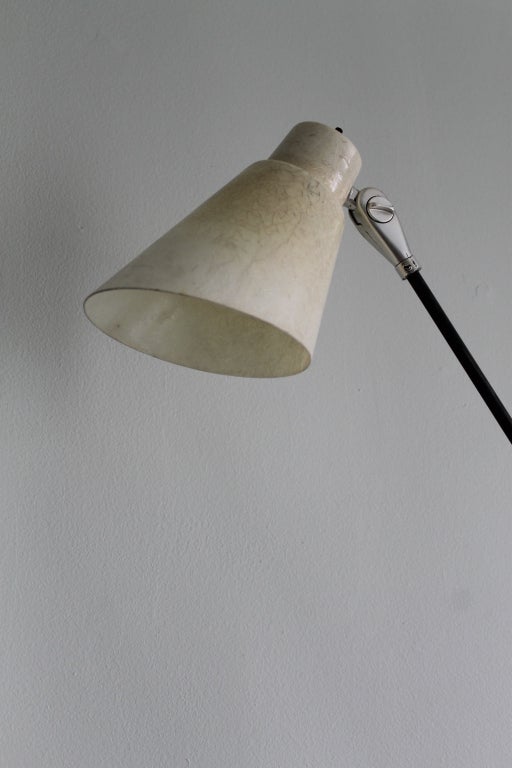 Gilbert A. Watrous light fixture.  We believe this to be Model No.  F-1-W Floor Light.  This fixture has an unusual shade.<br />
Gil was a former La Jolla resident and business owner who won a Good Design award for an intriguing low-cost light